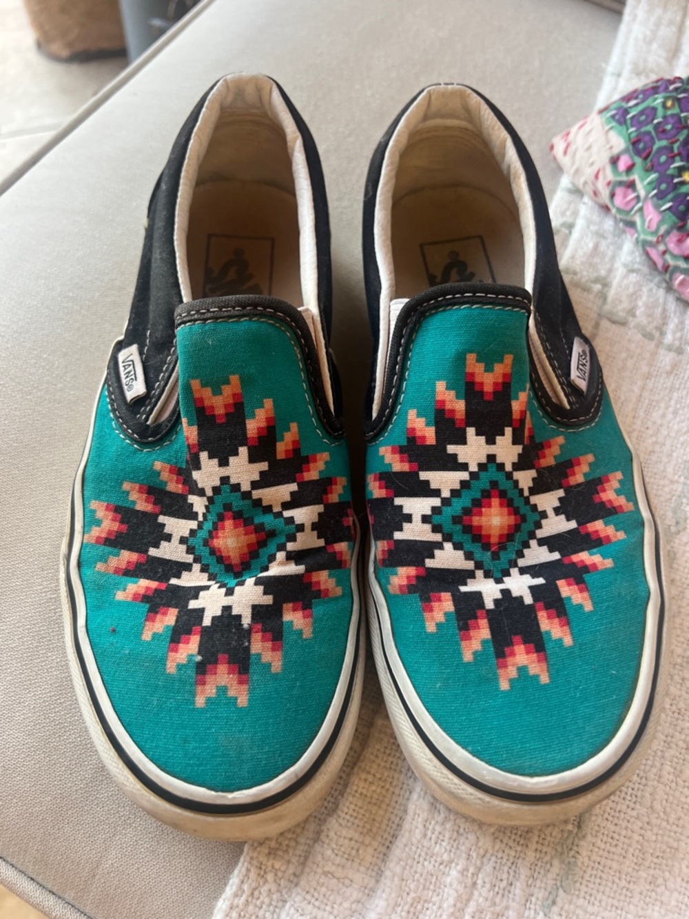Vans women’s Slip-On Sneakers in Teal with Aztec Print